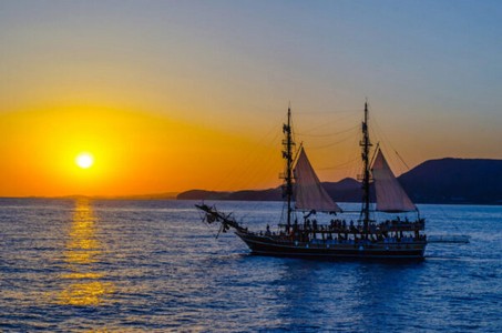 Two-masted,Sailing,Ship,On,The,Background,Of,The,Setting,Sun.